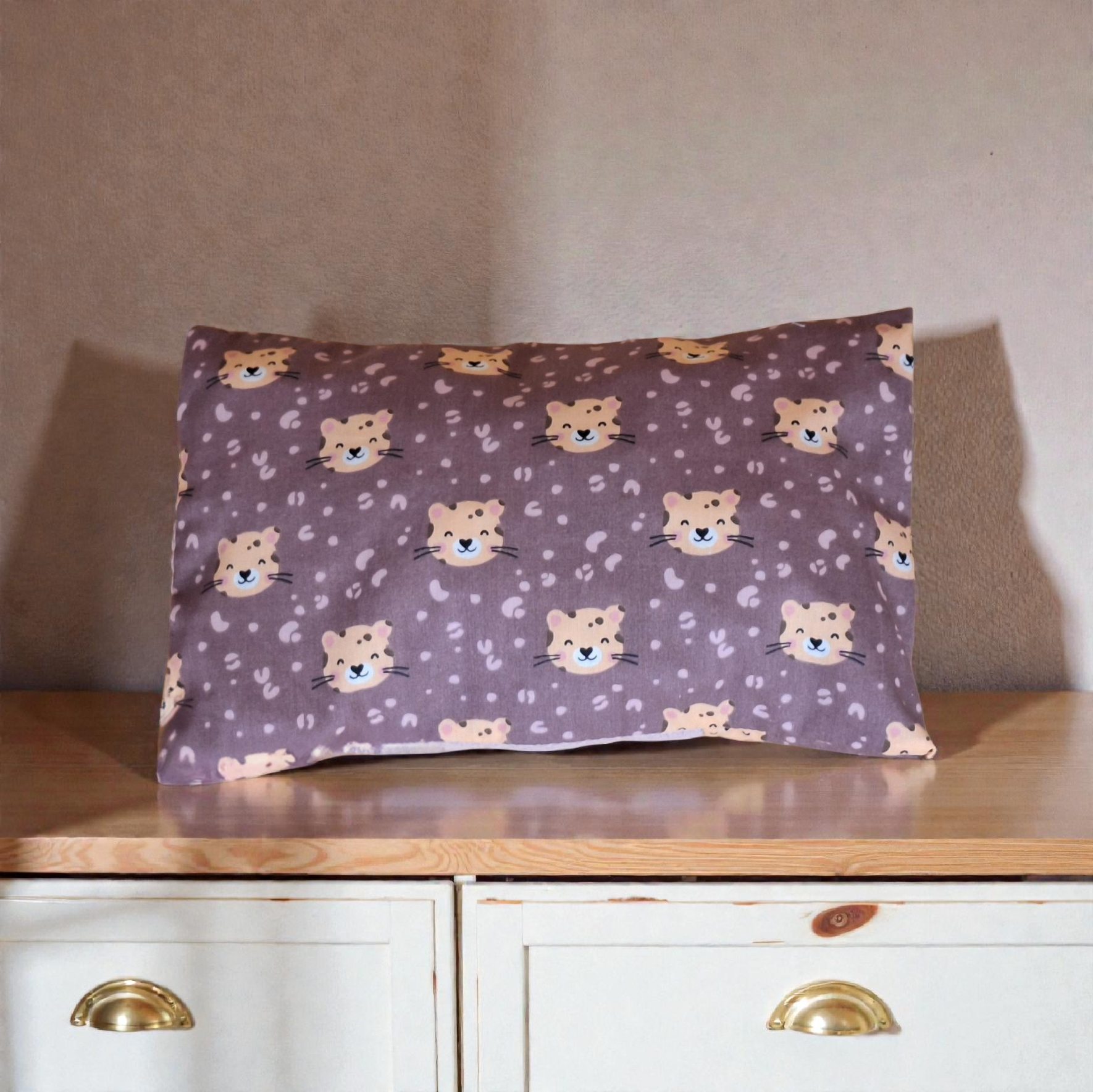 Zirben-Kirschkernkissen "Löwen"